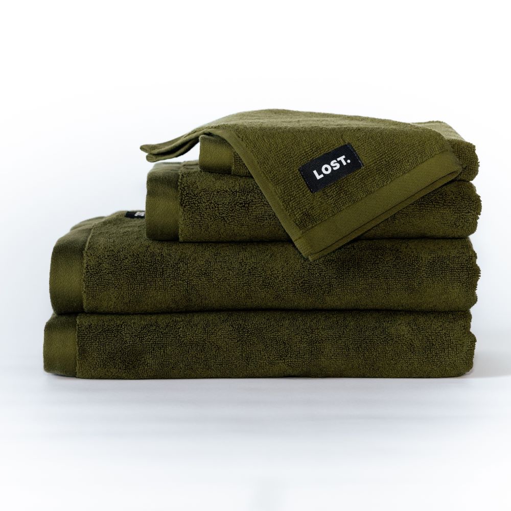 stack of khaki bath towels