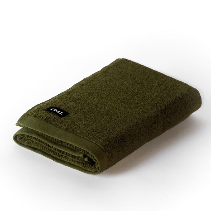 folded khaki bath towel