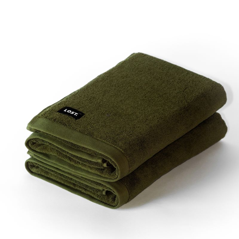 two folded khaki bath towels