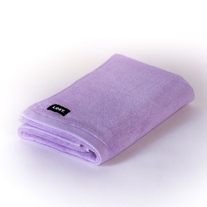 Folded lilac bath towel