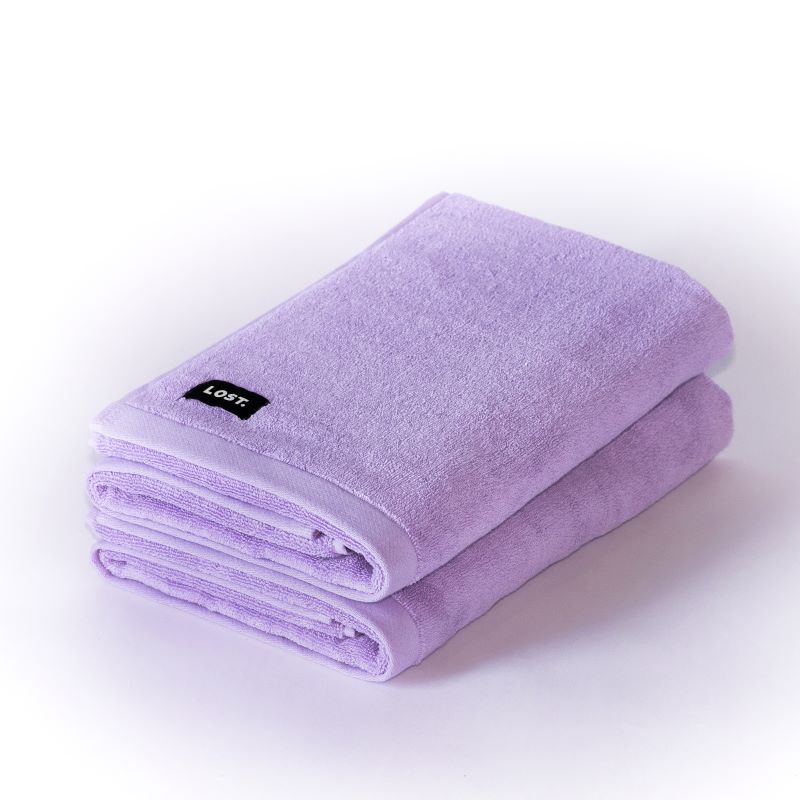 Two folded lilac towels