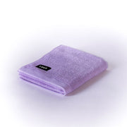 folded lilac hand towel