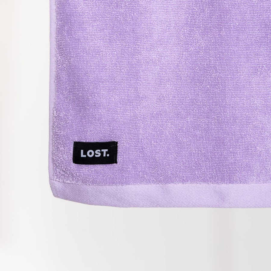 Lilac towel showing lost label